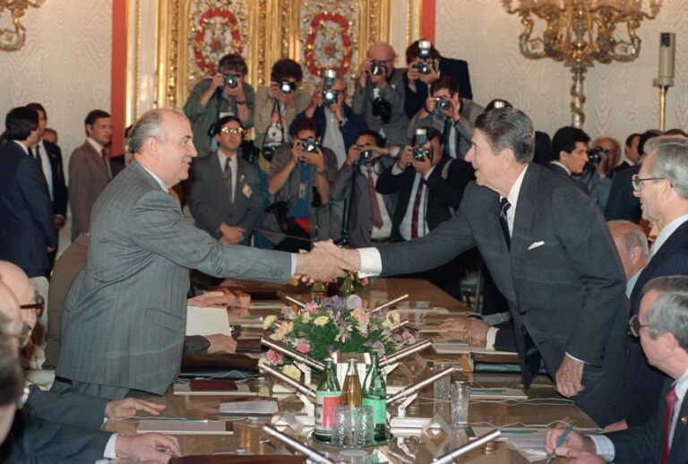 US President Ronald Reagan shakes hands with Soviet leader Mikhail Gorbachev at St. Catherine's Hall, in the Kremlin, on June 1, 1988.