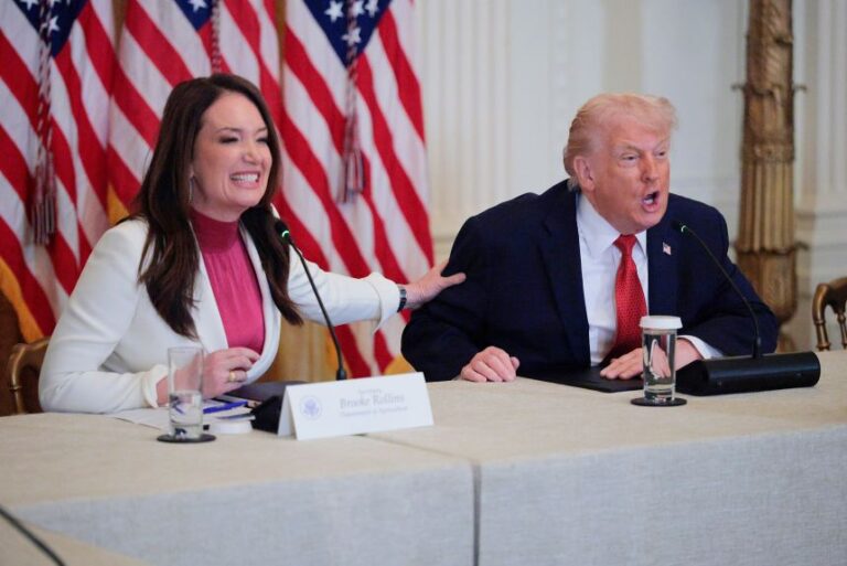 President Donald Trump jokes with Secretary of Agriculture Brooke Rollins during an event in the East Room of the White House on January 16.