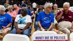 Attendees converse ahead of a town hall hosted by Democratic candidate for US Senate Abdul El-Sayed, part of a series of events across Michigan focused on hearing from voters, on September 3, 2026 at the Oakland Expo Center in Waterford, Michigan.