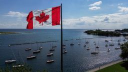 A Canadian flag flies along the waterfront of Lake Ontario, in Toronto, Ontario, Canada, on August 27.