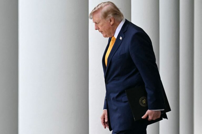 President Donald Trump arrives to speak in the Rose Garden of the White House on August 24.