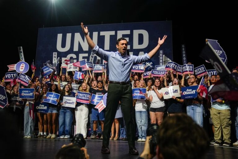 US Senator Jon Ossoff greets supporters during a campaign event at the Georgia Theater in Athens, Georgia, on September 13.