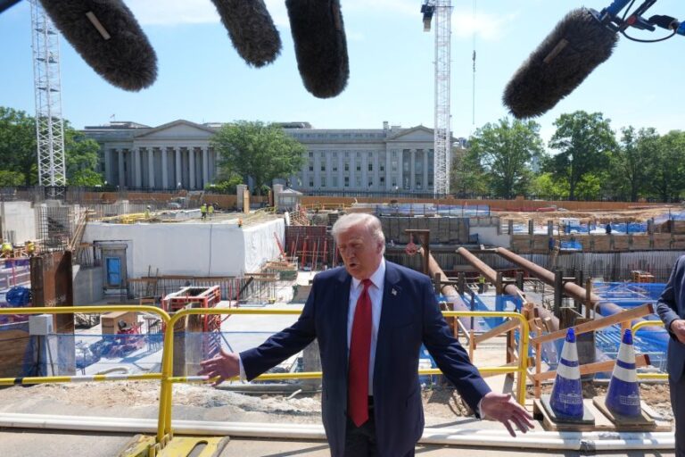 President Donald Trump speaks as he tours ballroom construction outside the White House on May 19.