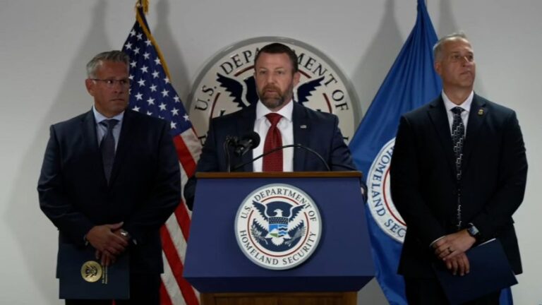 Secretary of Homeland Security Markwayne Mullin, center, speaks during a press conference in New York, on Tuesday, in this screengrab taken from a video.