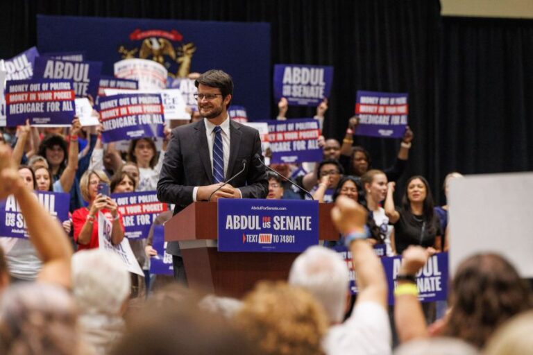 US House candidate William Lawrence speaks at a rally with US Senate candidate Abdul El-Sayed, US Sen. Bernie Sanders and US Rep. Alexandria Ocasio-Cortez in Lansing, Michigan on July 19.