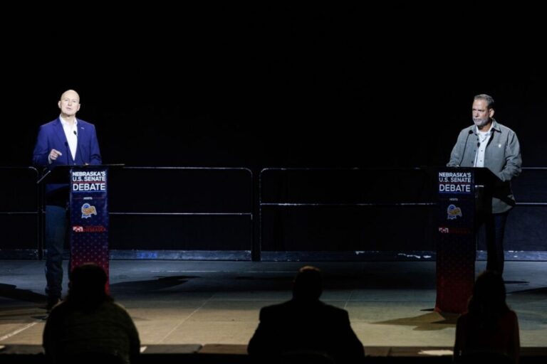 Sen. Pete Ricketts and Dan Osborn participate in a debate at the Nebraska State Fair in Grand Island on September 1.