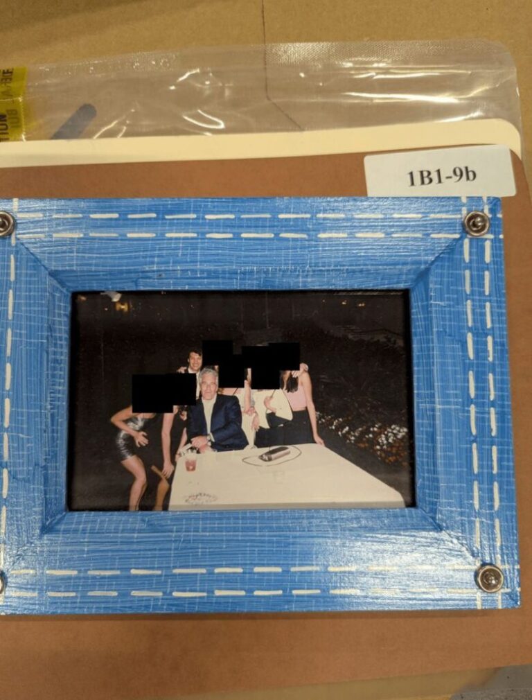 Frederic Fekkai and Jeffrey Epstein are seen in this photograph released by the Justice Department, as a part of its release of files related to Jeffrey Epstein. A portion of the image was redacted before its release.