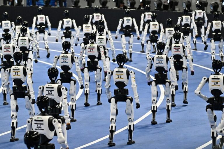 Humanoid robots take part in the opening ceremony of the 2nd World Humanoid Robot Games in Beijing, on August 22.