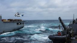 An EC-225 Super Puma approaches the flight deck of the USNS Wally Schirra, during a replenishment-at-sea with the guided-missile destroyer USS Mason, on September 9.