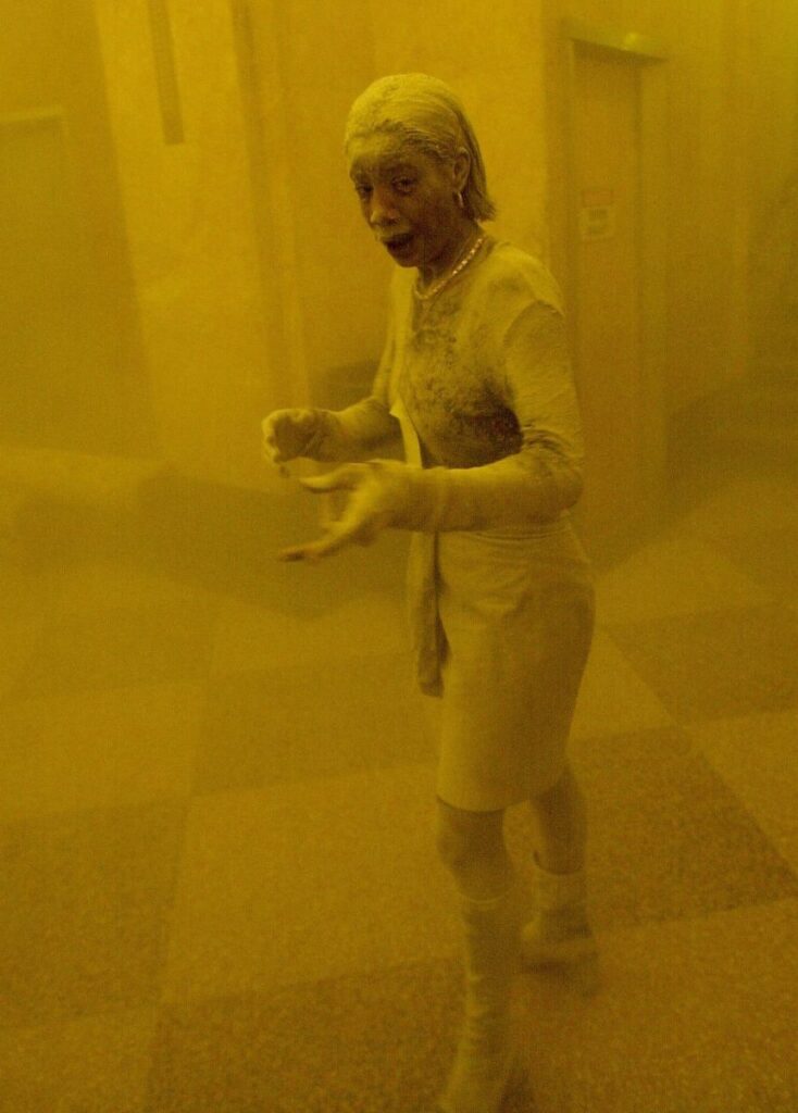 Marcy Borders is seen covered in dust in an office building on September 11, 2001.