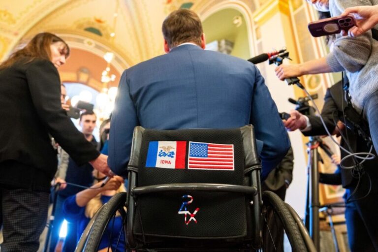 Iowa Rep. Josh Turek takes questions from the media after filing to appear on the Iowa ballot in the Democratic primary for US Senate on March 12, at the Iowa State Capitol.