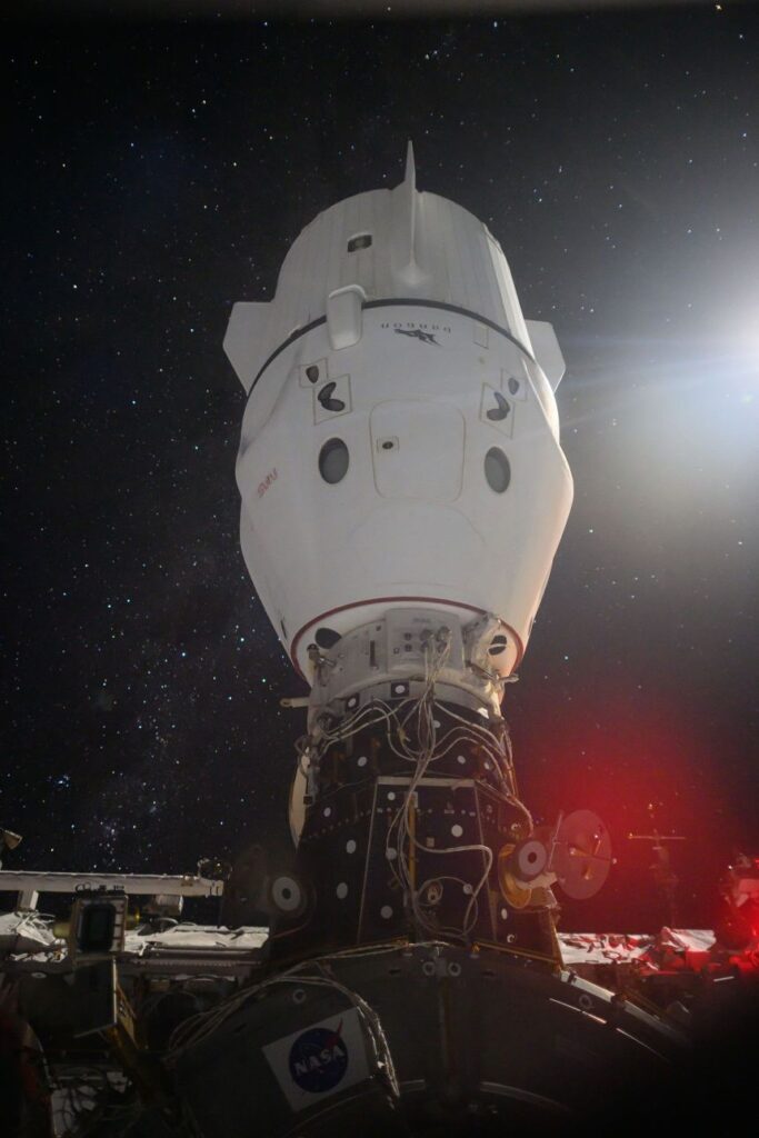The SpaceX Dragon Endeavour spacecraft is pictured docked to the Zenith port of the International Space Station's Harmony module as the orbiting complex soared 265 miles above the Indian Ocean.