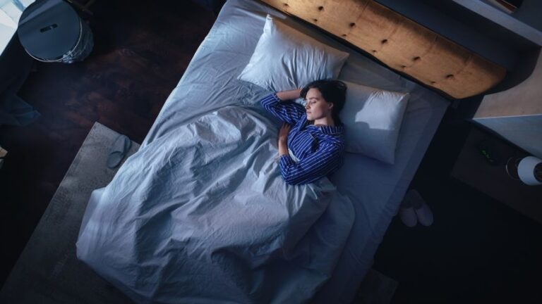 Blackout shades work well to block outside light. If those fail, try a sleeping mask.