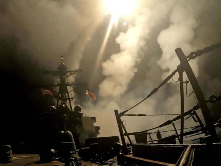 A ship fires missiles at an undisclosed location after President Donald Trump launched military strikes against Yemen's Iran-aligned Houthis in this screengrab obtained from a handout video released on March 15.