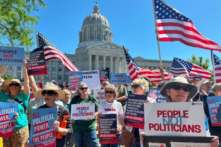 Protesters against Missouri's congressional redistricting plan gather outside the Missouri Capitol in Jefferson City, on May 12.