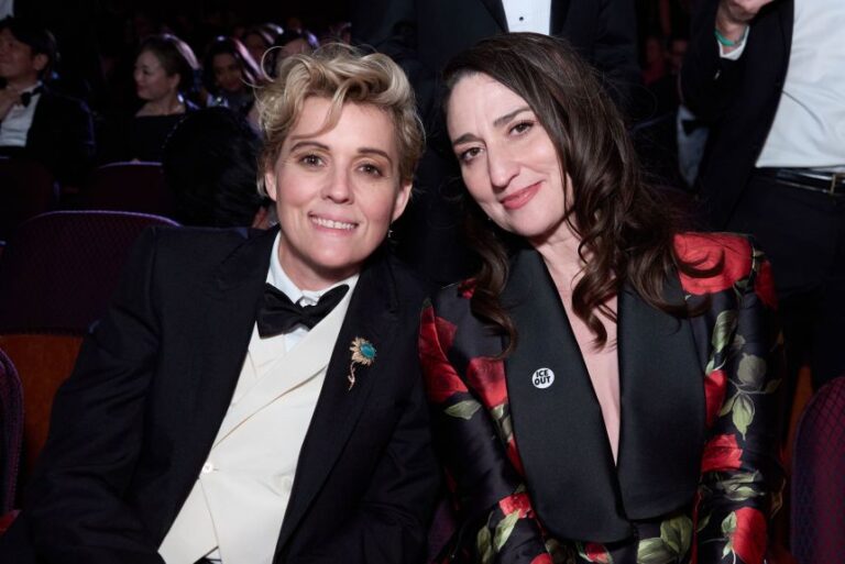 Sara Bareilles (right) is shown with Brandi Carlile at the Oscars in March. They collaborated on the song “Salt Then Sour Then Sweet” with the late poet Andrea Gibson.