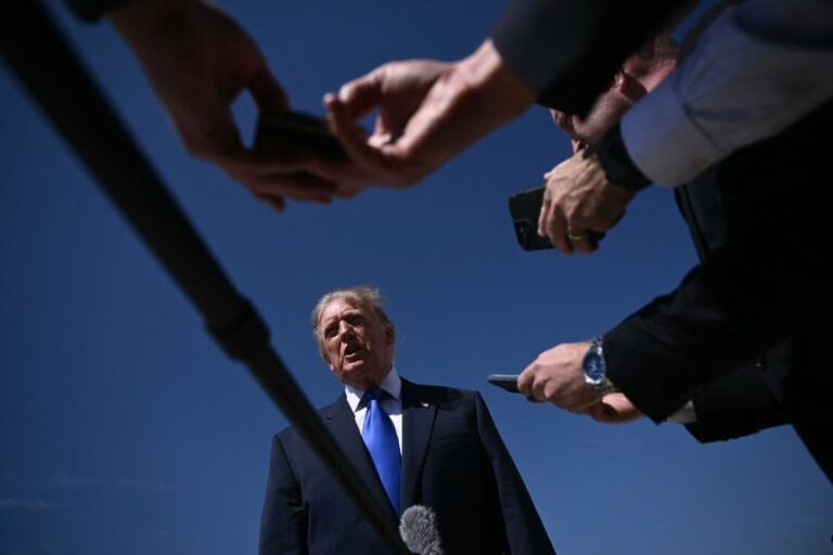 President Donald Trump speaks to reporters before boarding Air Force One at Joint Base Andrews in Maryland on September 9.