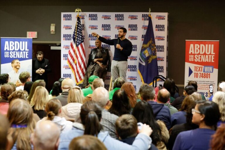 El-Sayed speaks on stage with Rep. Ayanna Pressley during a campaign rally in Flint, Michigan, on Sunday.