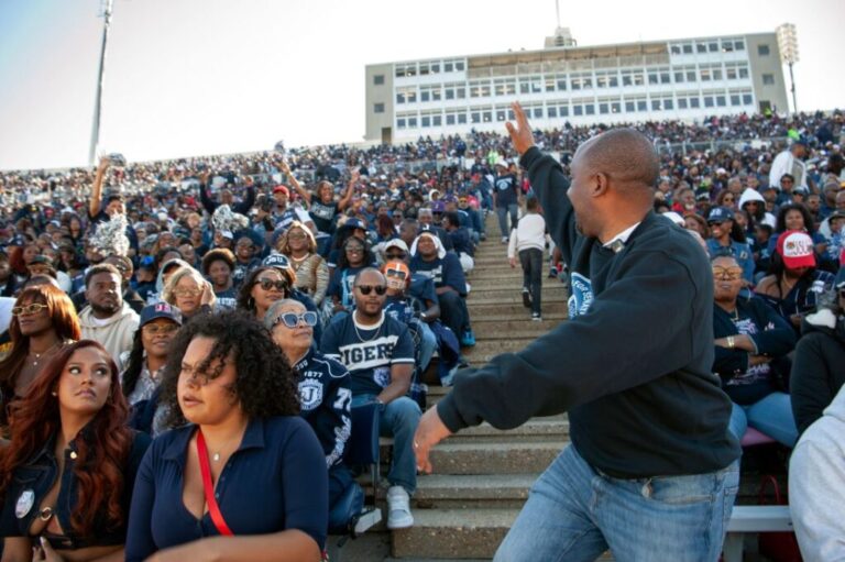 Colom campaigns inside Mississippi Veterans Memorial Stadium during the game.