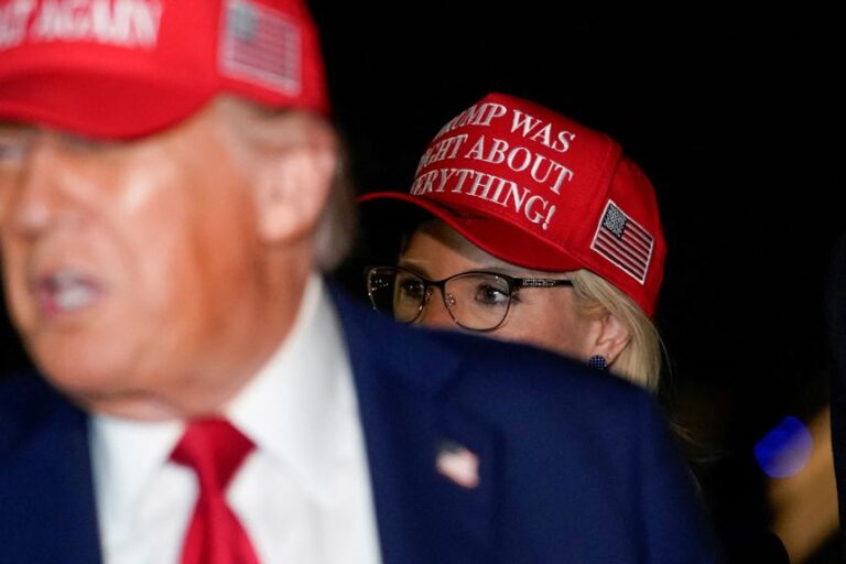 US Representative Ashley Hinson looks on as President Donald Trump speaks at Joint Base Andrews, Maryland, following a visit to Iowa, on July 4, 2025.