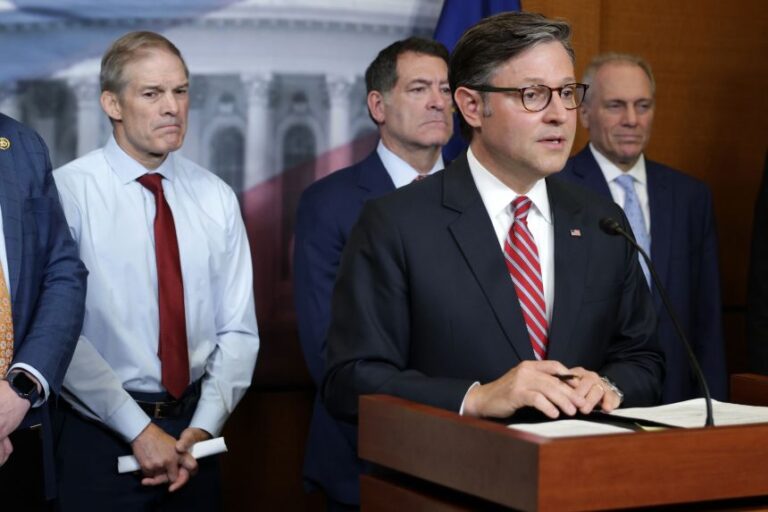 Jordan and other Republicans stand behind House Speaker Mike Johnson during a news briefing in 2025.