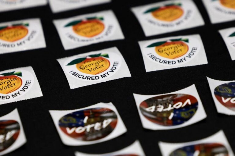 I Voted stickers are ready for voters on the first day of early voting in Atlanta on October 13.