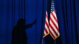 President Donald Trump casts a shadow while leaving a campaign rally in Durant, Oklahoma on October 1.
