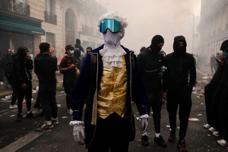 A protester wearing a period costume stands during a demonstration in Paris on Saturday.