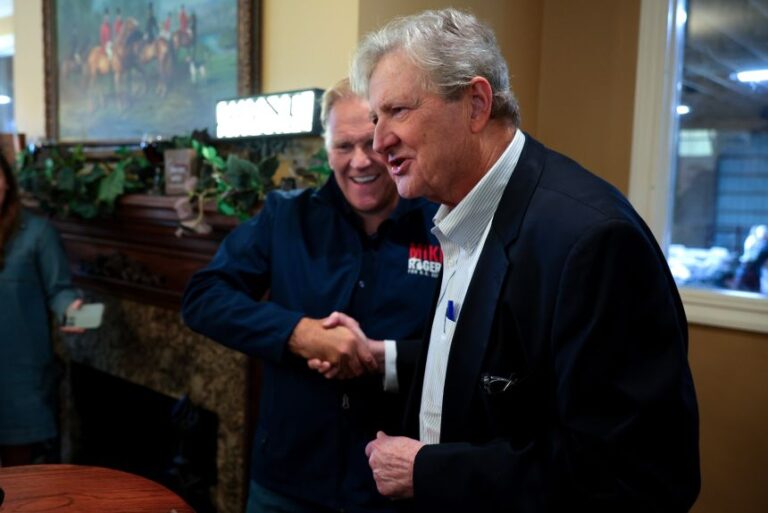 Michigan Republican Senate candidate, former U.S. Rep. Mike Rogers (L) and Sen. John Kennedy (R-LA) shake hands before talking to reporters at a campaign event at Hoffman Farms Winery on October 09, 2026 in Highland Township, Michigan. An Army veteran and former FBI special agent, Rogers is polling behind his opponent, Michigan Democratic Senate candidate Abdul El-Sayed, however the lead remains within the margin of error.