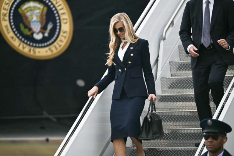 White House press secretary Katie Zacharia disembarks Air Force One at Elmendorf Air Force Base in Anchorage, Alaska, on October 13, 2026.