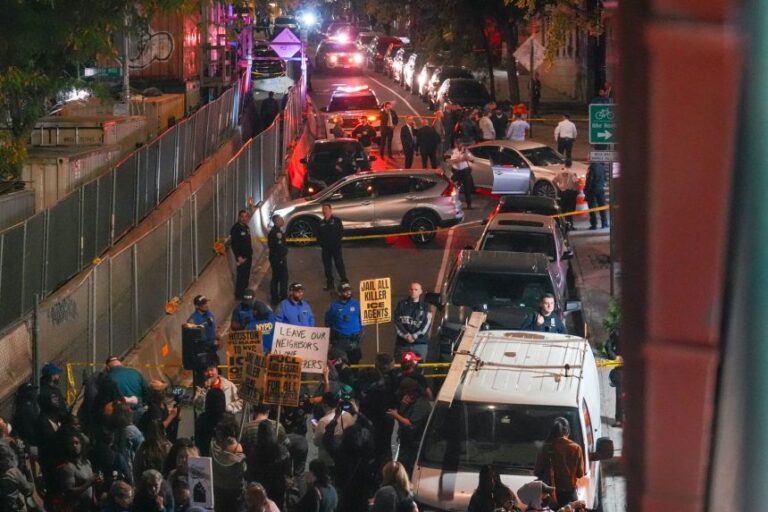 A car reportedly belonging to a man who was shot by an Immigration and Customs Enforcement (ICE) officer during an operation is roped off with police tape on October 8, in the Bronx borough of New York City.