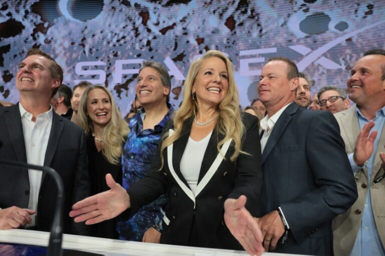Gwynne Shotwell, president of SpaceX, is joined by company leadership as they ring the opening bell at the Nasdaq Marketsite at the launch of the company's initial public offering in June.