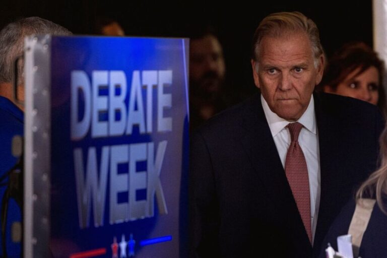 Mike Rogers arrives to speak to the press after taking part in a debate with Abdul El-Sayed in Grand Rapids, Michigan, on October 8.