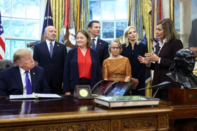 US Rep. Ashley Hinson, second from right, watches as Iowa Gov. Kim Reynolds speaks during an announcement of a $15 billion steel mill in Iowa, in the White House in Washington, DC, with Donald Trump on September 28.