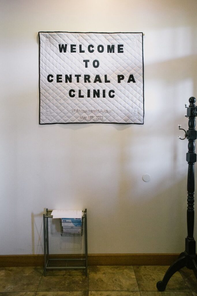 A handmade quilt adorns the clinic's vestibule.