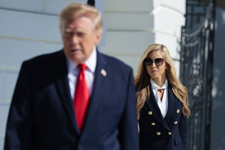 White House press secretary Katie Zacharia joins President Donald Trump as he departs on the South Lawn of the White House on October 13, 2026.