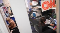 CNN White House Senior Reporter Betsy Klein and CNN White House Reporter Molly English work in the CNN office after being allowed back on to the grounds of the White House on September 24 in Washington, DC.
