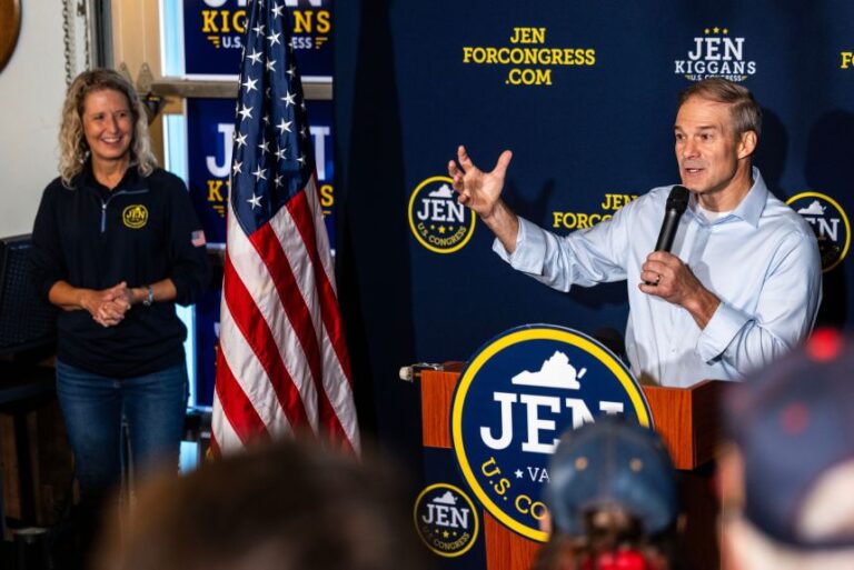 US Rep. Jen Kiggans listens to Jordan share his endorsement of her during a campaign rally in Chesapeake, Virginia, on September 26.