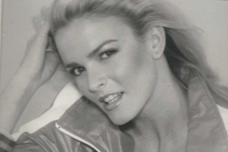 Brown describes Nicole, seen on a poster, as a charming, strong, fun and loving person.