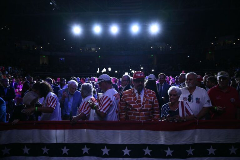 Supporters of US President Donald Trump wait for him to speaks at a midterm campaign rally at The Mitchell Center of the University of South Alabama in Mobile, Alabama on October 2.