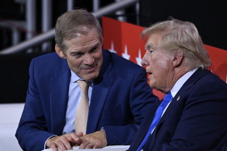 Jordan sits with Donald Trump during the second day of the Republican National Convention in 2024.