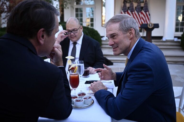Jordan talks with Attorney General Todd Blanche, left, at a Rose Garden dinner last month.