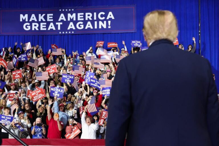President Donald Trump looks at supporters during a campaign rally to support Republican House candidate Ed Gallrein and Senate candidate Andy Barr in Highland Heights, Kentucky, on October 17.