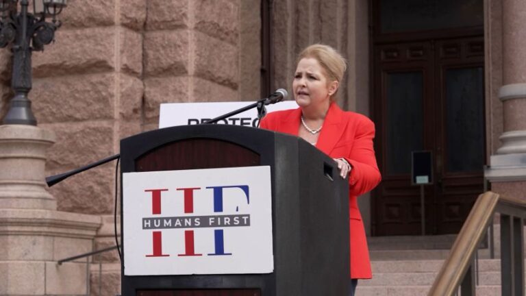 Amy Kremer, chair of the group Humans First, addresses a rally in Austin, Texas in September.