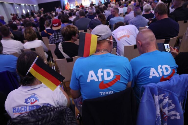 Supporters of the far-right Alternative for Germany party (AfD) arrive for an election campaign rally ahead of state elections on September 18, 2026, in Neubrandenburg, Germany.