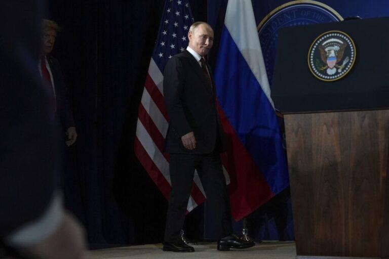 President Donald Trump, left, and Russia's President Vladimir Putin arrive for a press conference at Joint Base Elmendorf- Richardson in Anchorage, Alaska, on August 15, 2025.